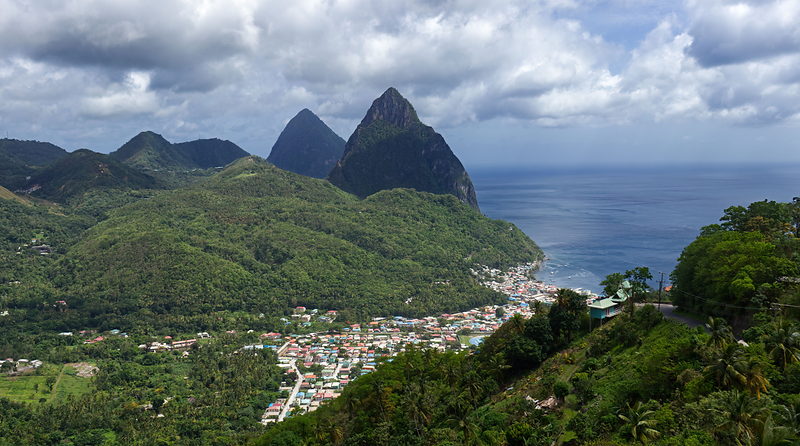 The town of Soufriere, Saint Lucia, spread along the coast below the Pitons